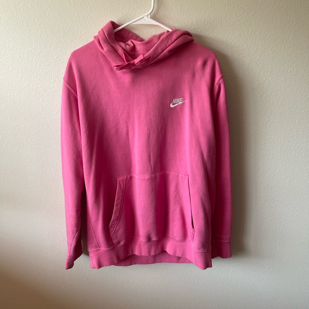 pink nike hoodie.